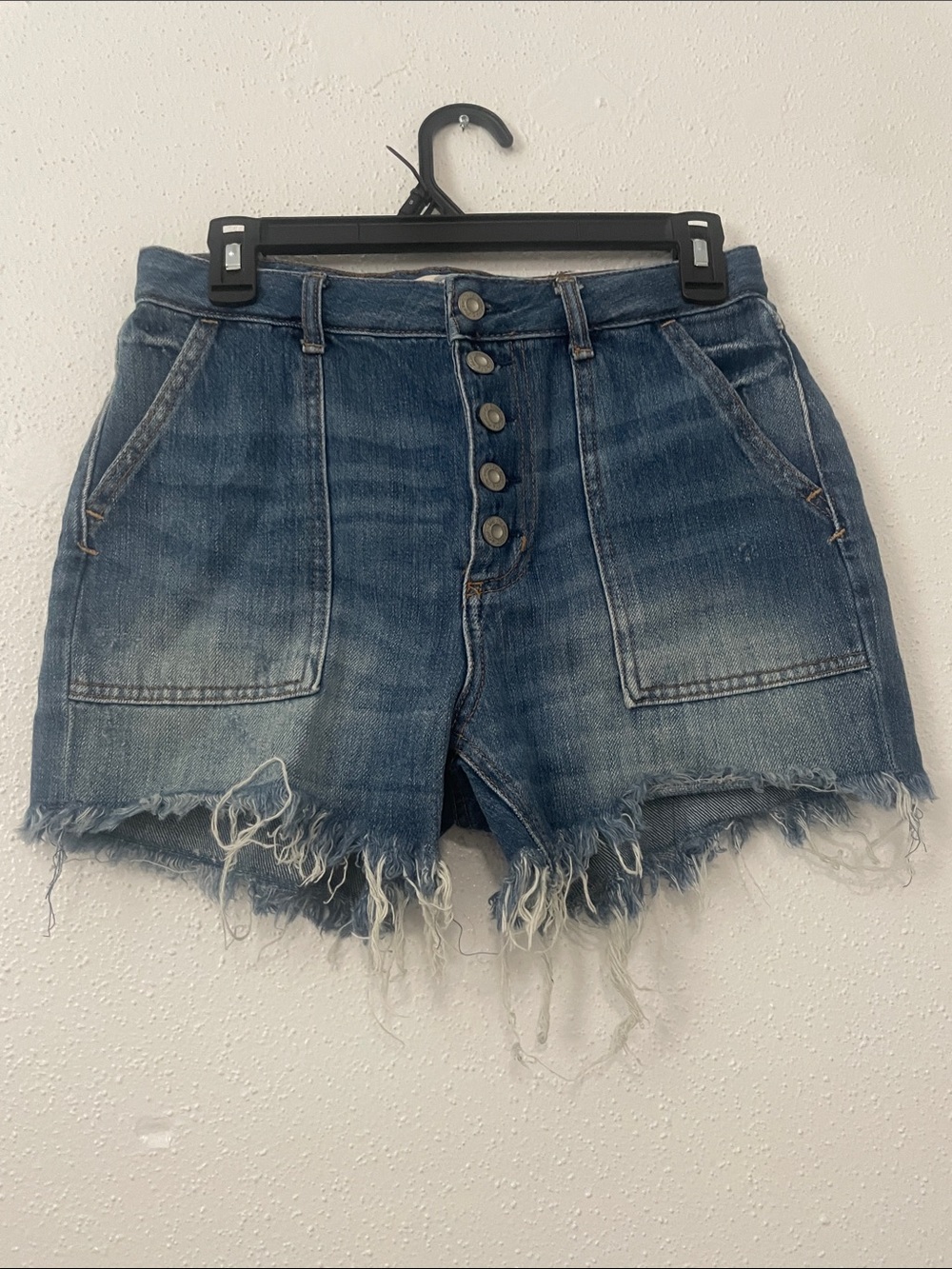 We The Free Distressed Mid-Blue High-Rise Button Denim Shorts